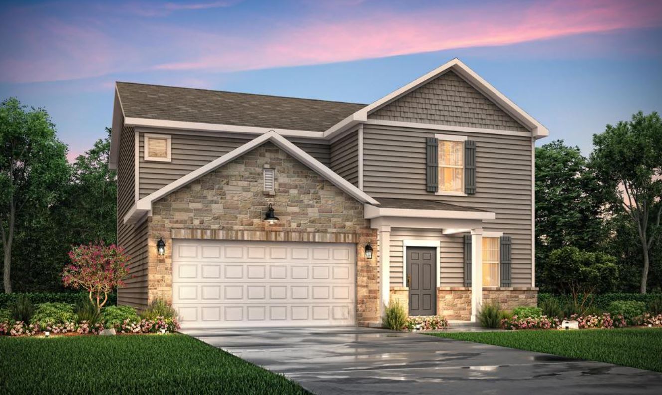 A house with trees and grass.