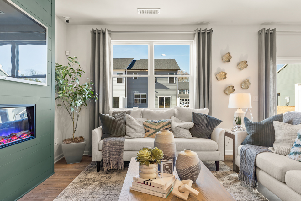 A living room with a large window.