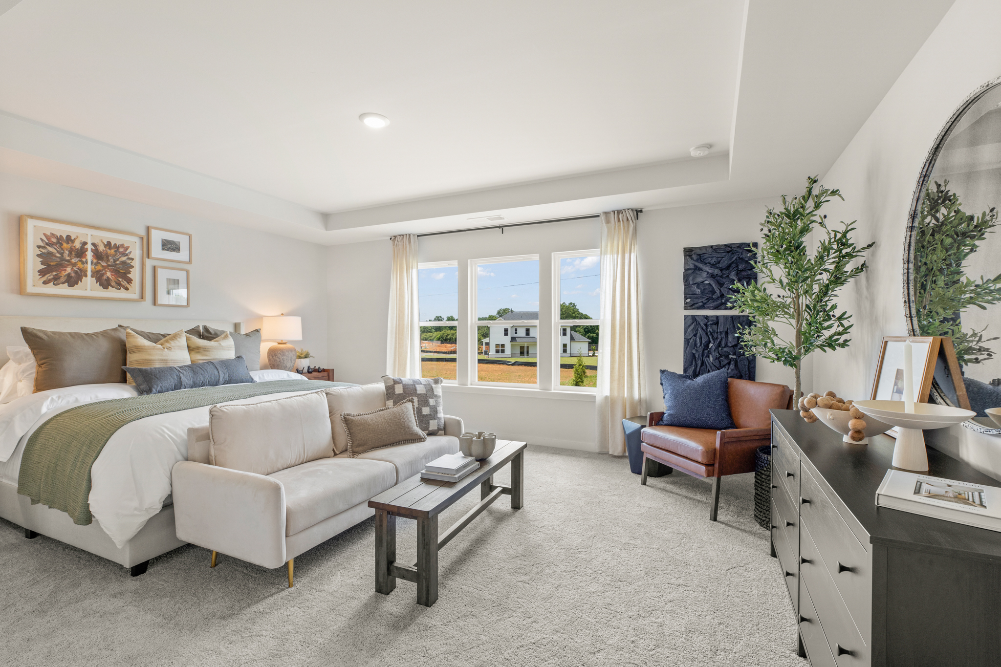 A living room with a large window.