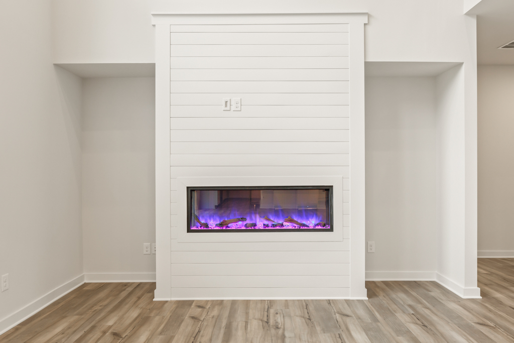 A fireplace in a room.