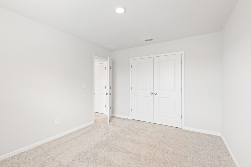 A room with white doors.