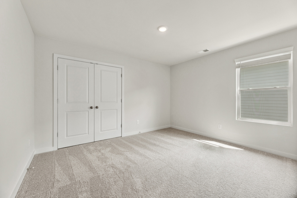 A room with white doors.
