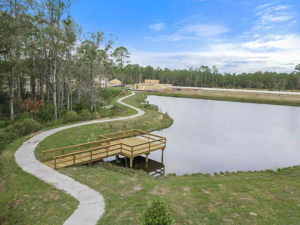 A wooden bridge over a river.