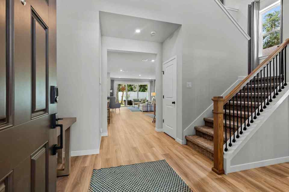 A large house with a wood floor.