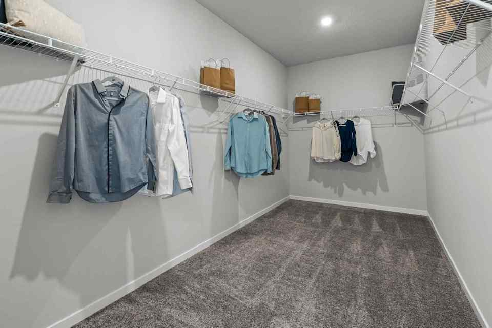 A room with a white wall and a white wall with a white wall with a white wall with.