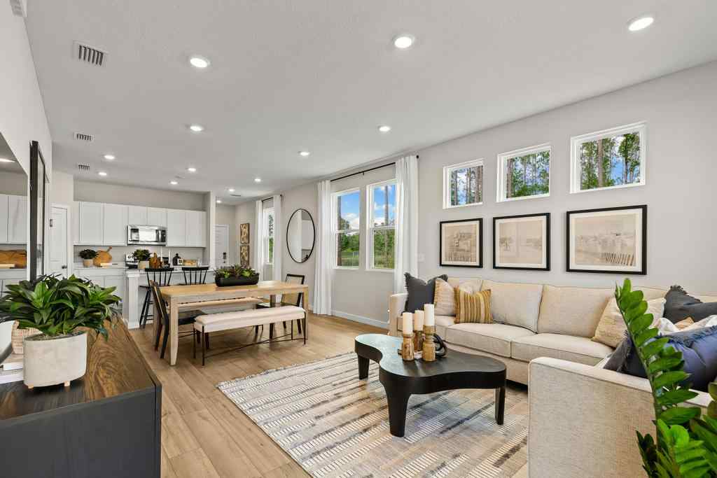 A living room with a couch and a table.