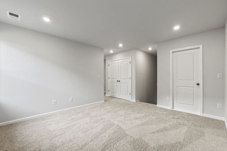 A room with white doors.