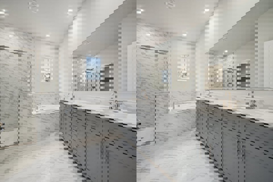 A bathroom with a tub and sink.