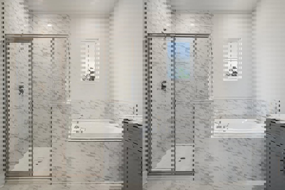 A bathroom with a glass shower.