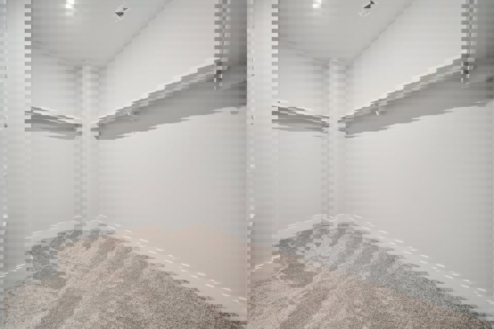 A white room with a white wall.