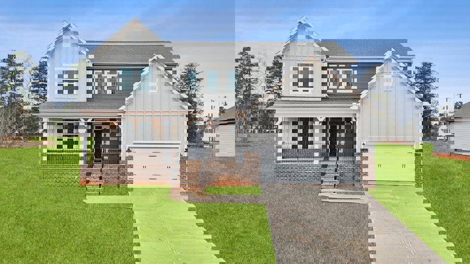 A house with a driveway.