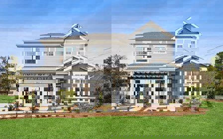 A house with a sign on the front.