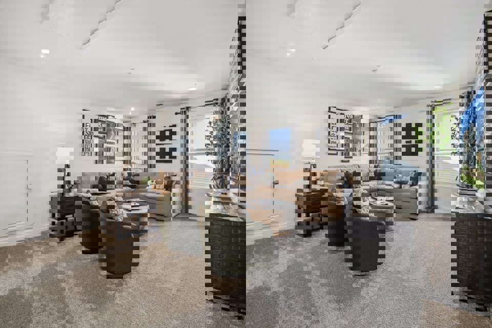 A living room with a couch and a coffee table.