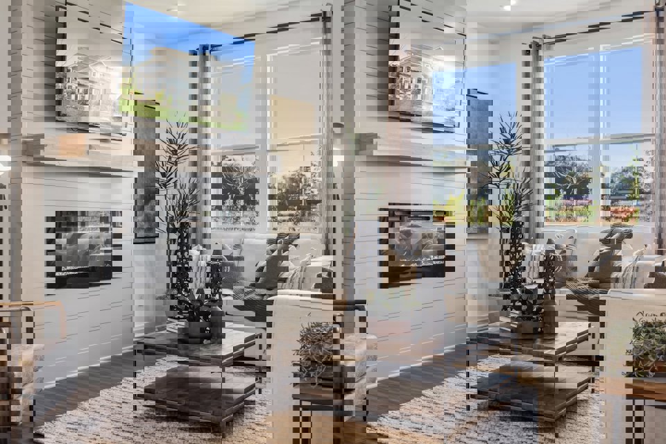 A living room with a fireplace.