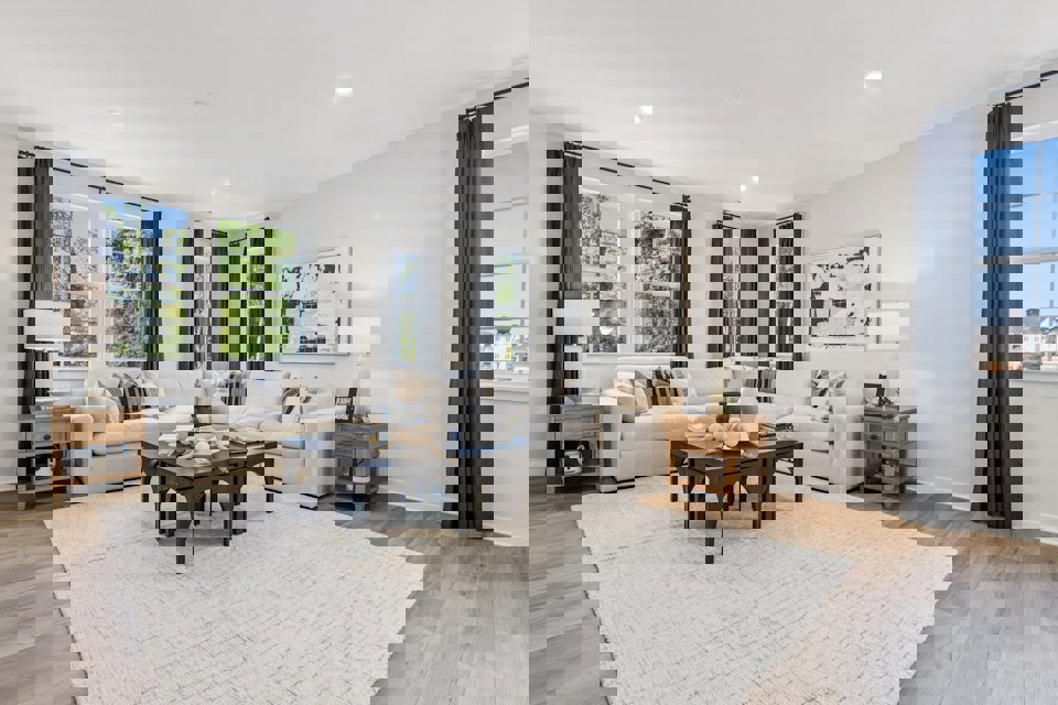 A living room with a large window.