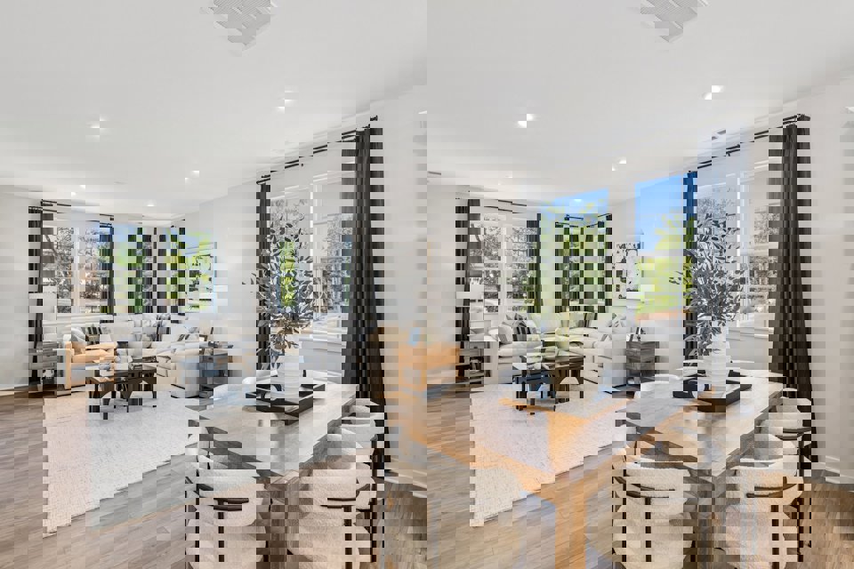 A living room with a large window.