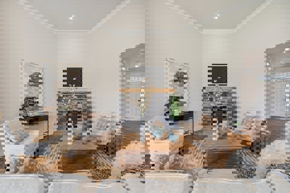 A living room with a fireplace.