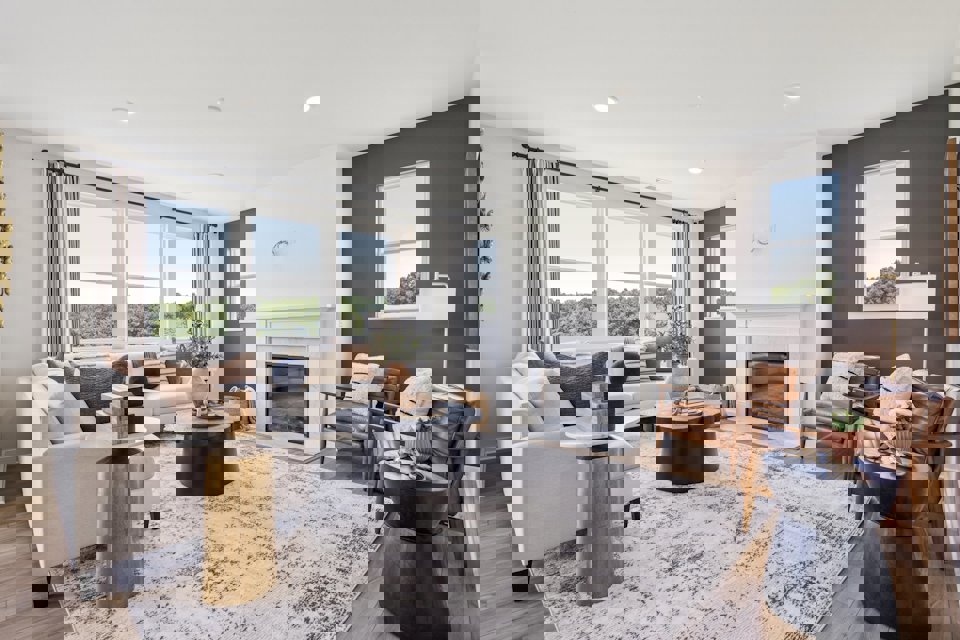 A living room with a fireplace.