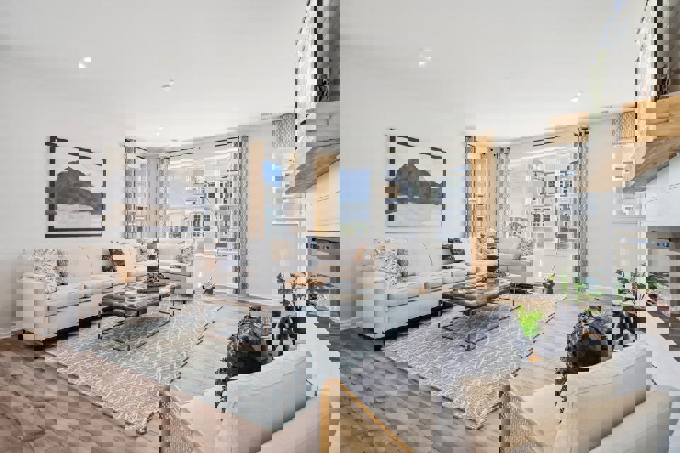 A living room with a large window.