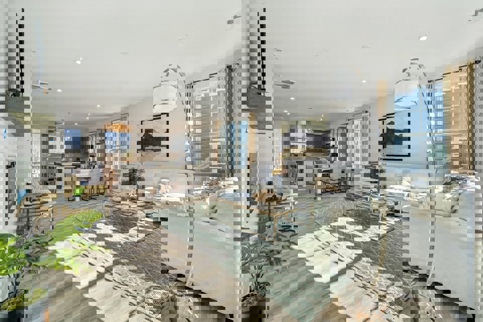 A living room with a rug and a rug.