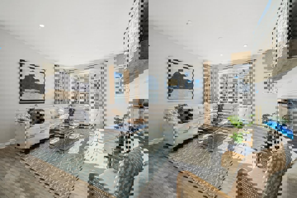 A living room with a large window.