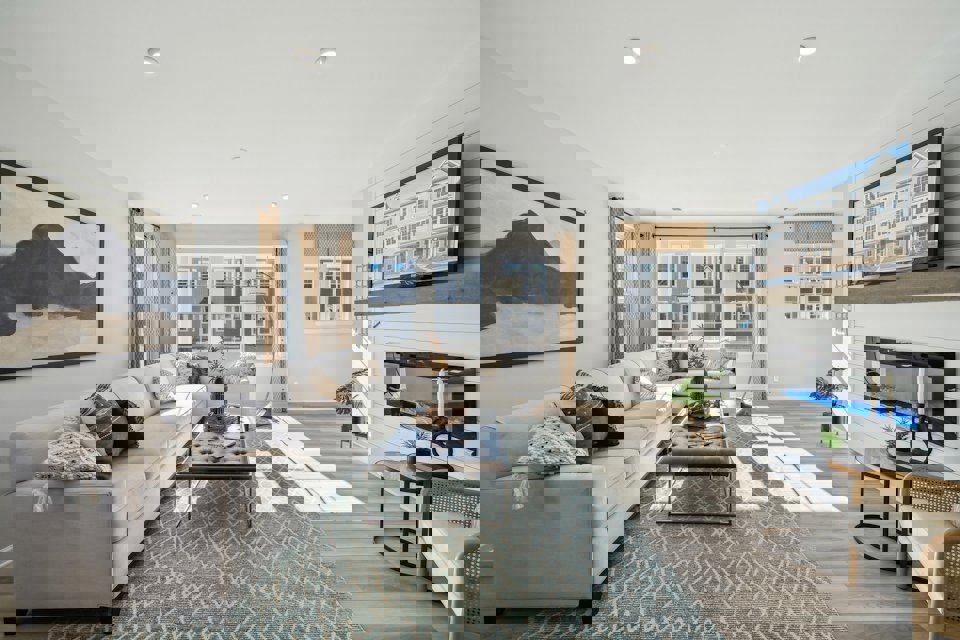 A living room with a fireplace.