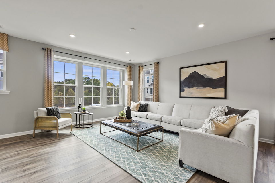 A living room with a large window.