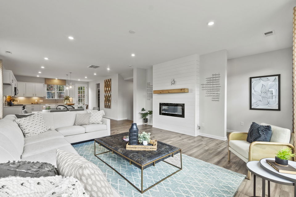 A living room with a fireplace.