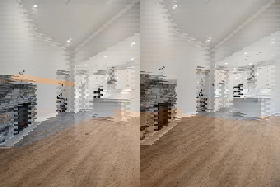 A large kitchen with a fireplace.