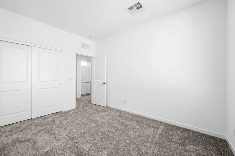 A room with white doors.