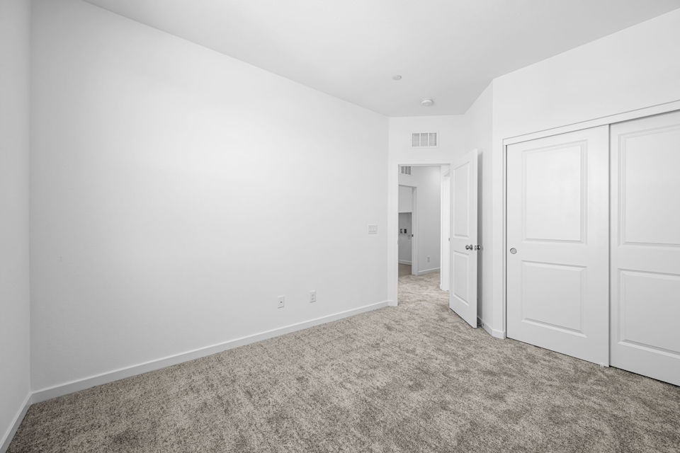 A room with white doors.