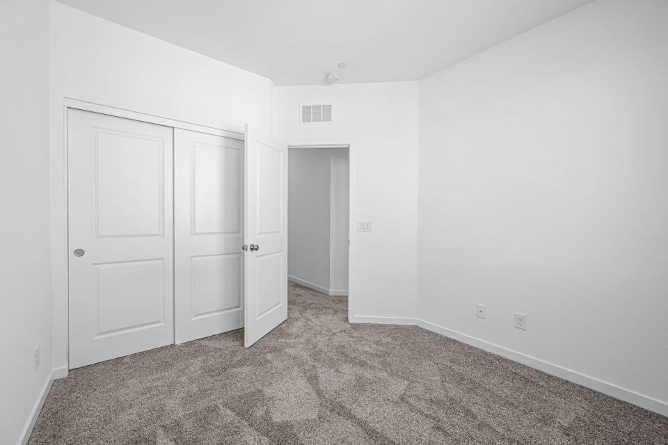 A room with white doors.