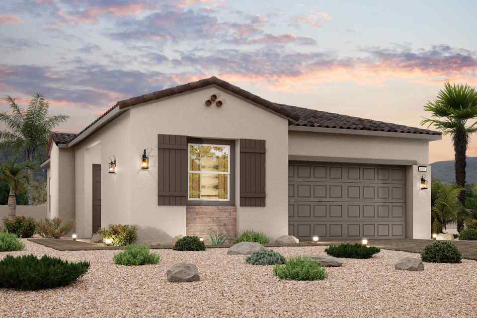 A house with a driveway and a gravel driveway.
