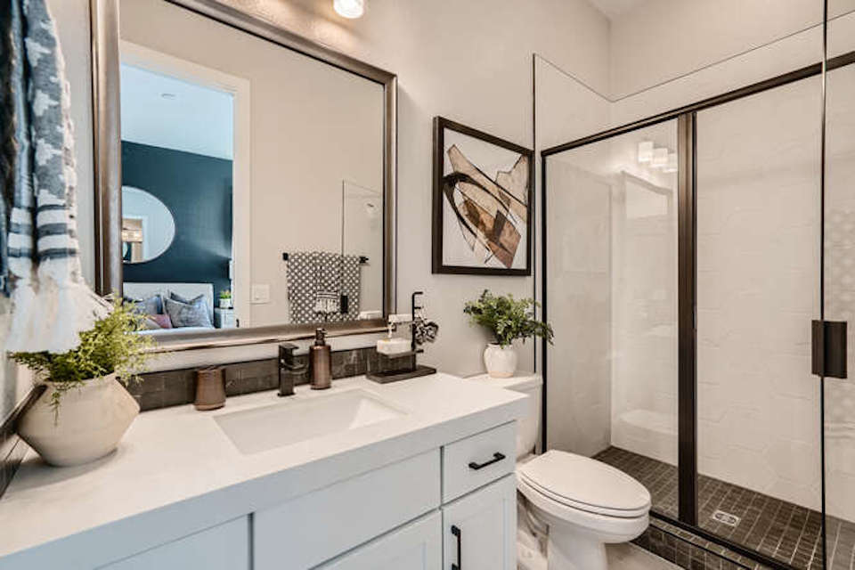 A bathroom with a glass shower.