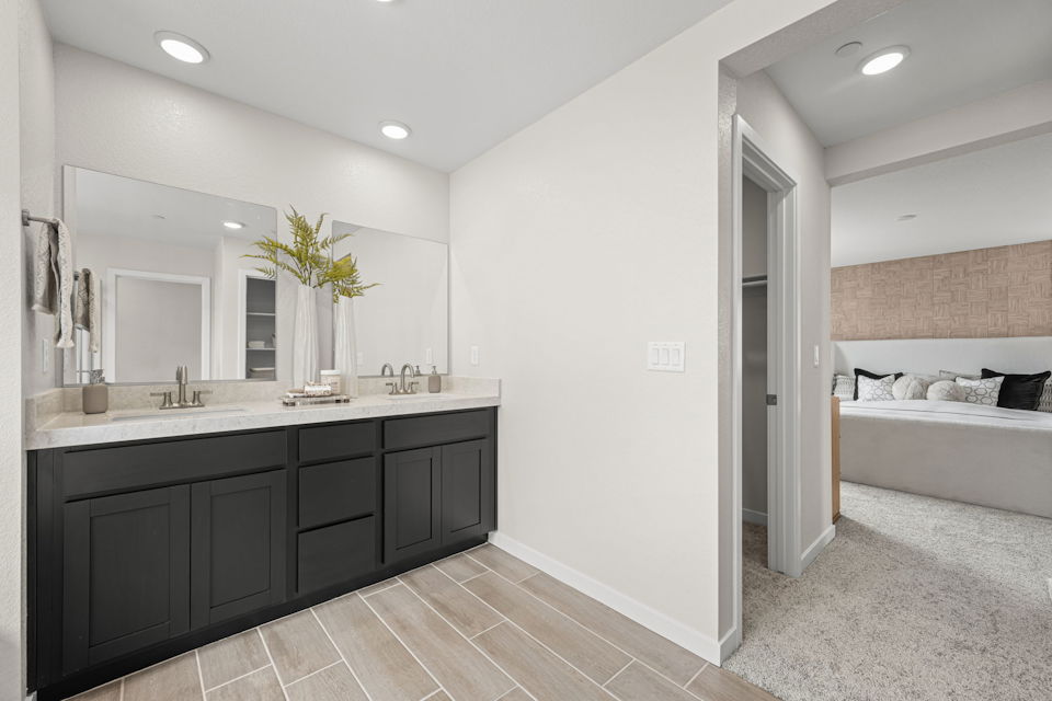 A bathroom with a tub sink and a bathtub.