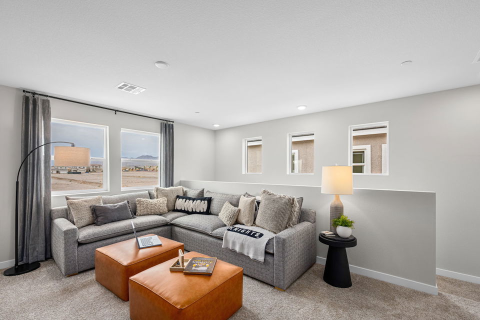 A living room with a couch and a coffee table.