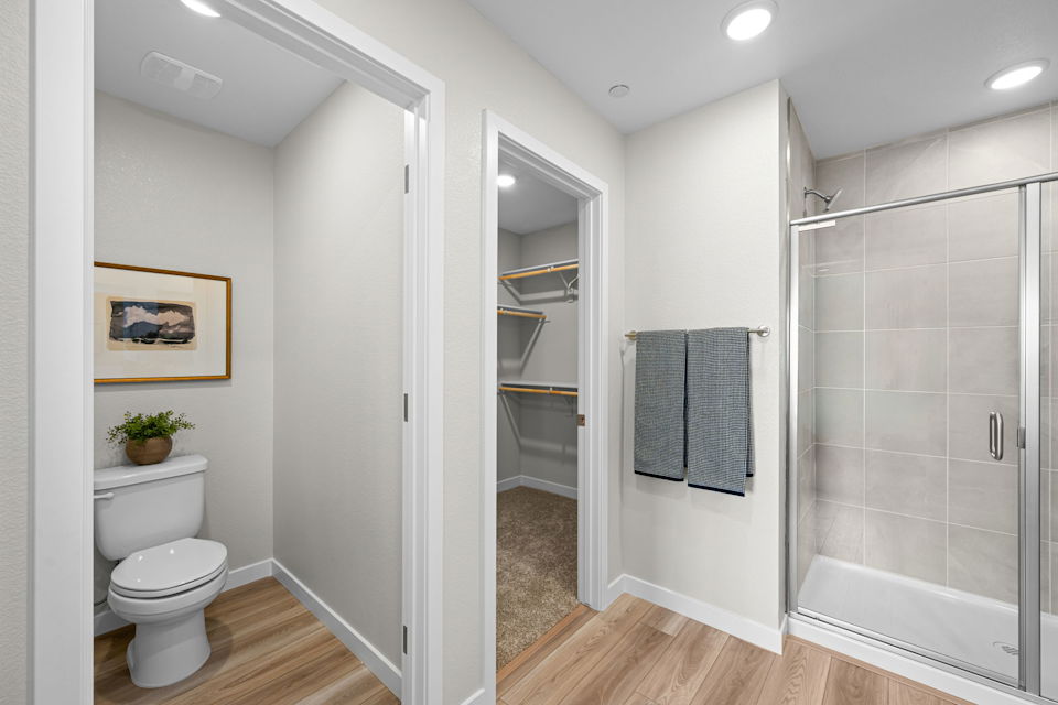 A bathroom with a glass shower.