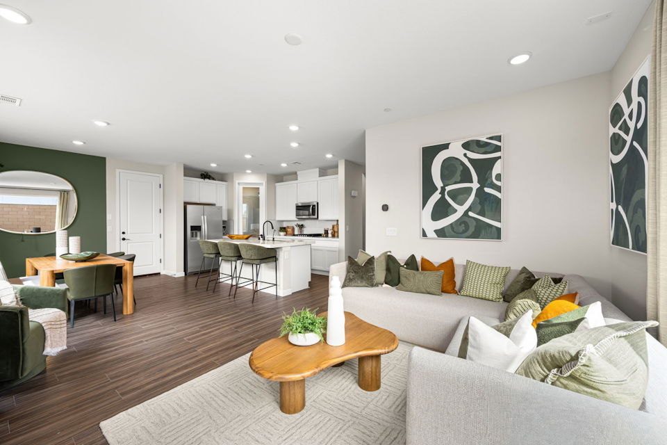 A living room with a couch and a table.