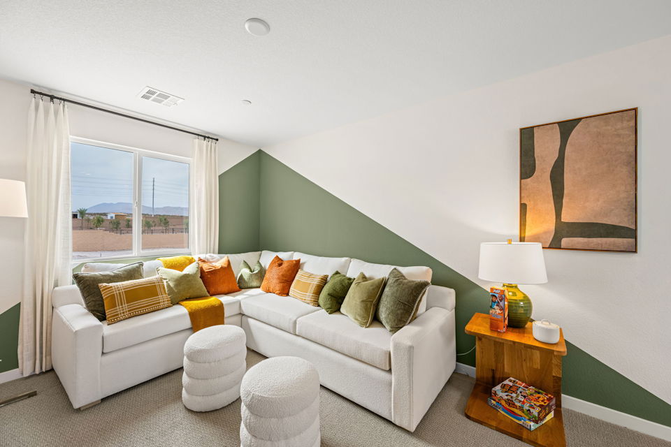 A living room with a couch and a coffee table.