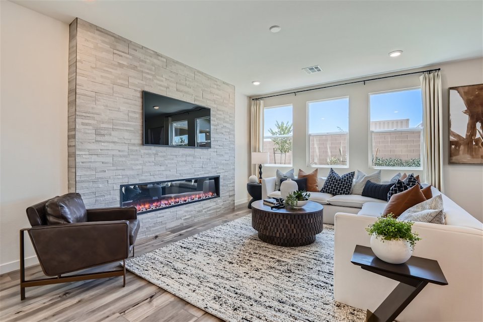 A living room with a fireplace.