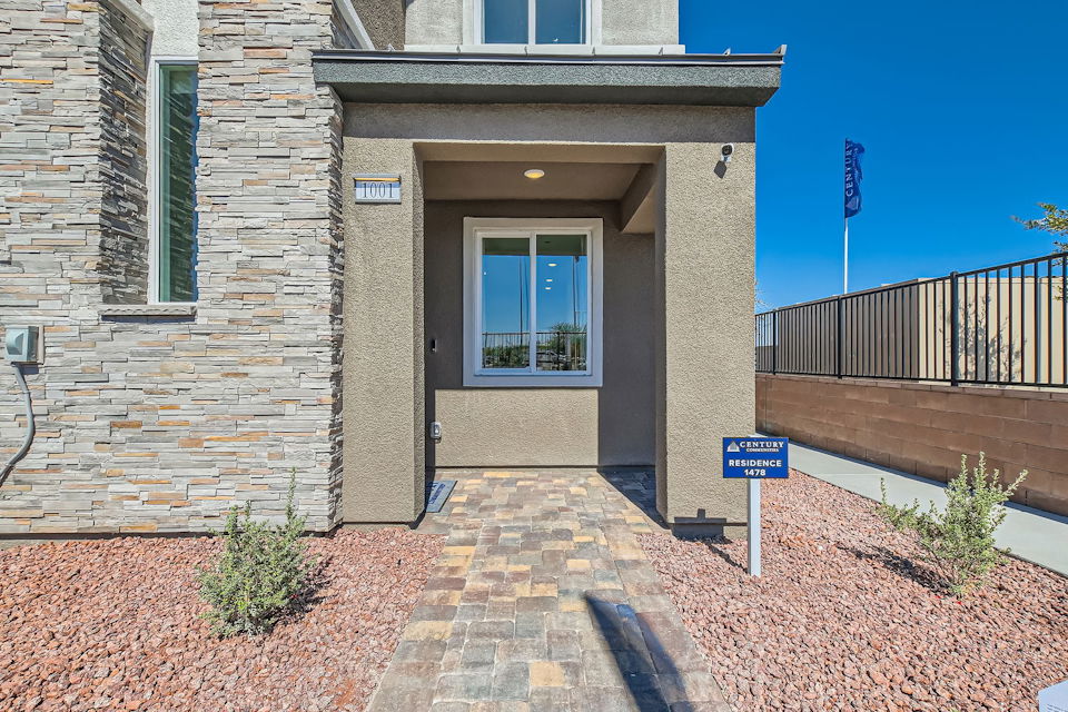 A building with a sign in front.