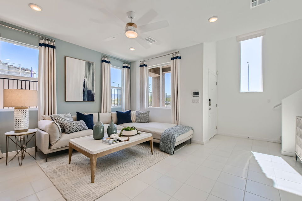 A living room with a couch and a coffee table.