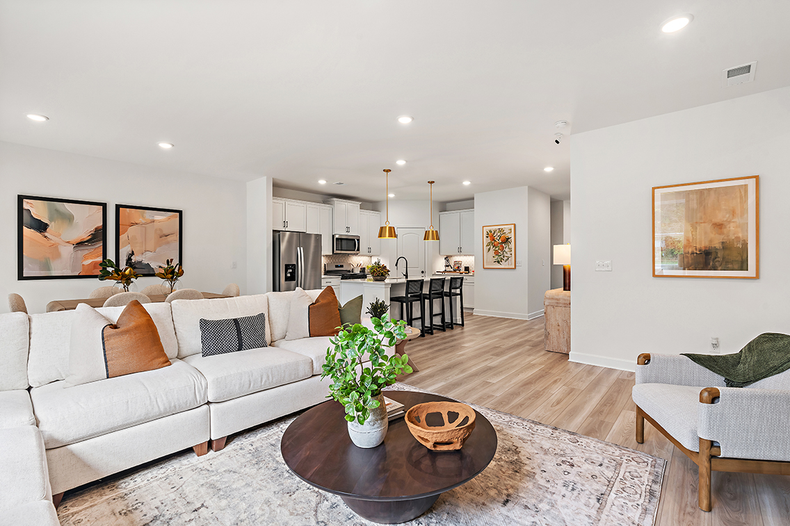 A living room with a couch and a coffee table.
