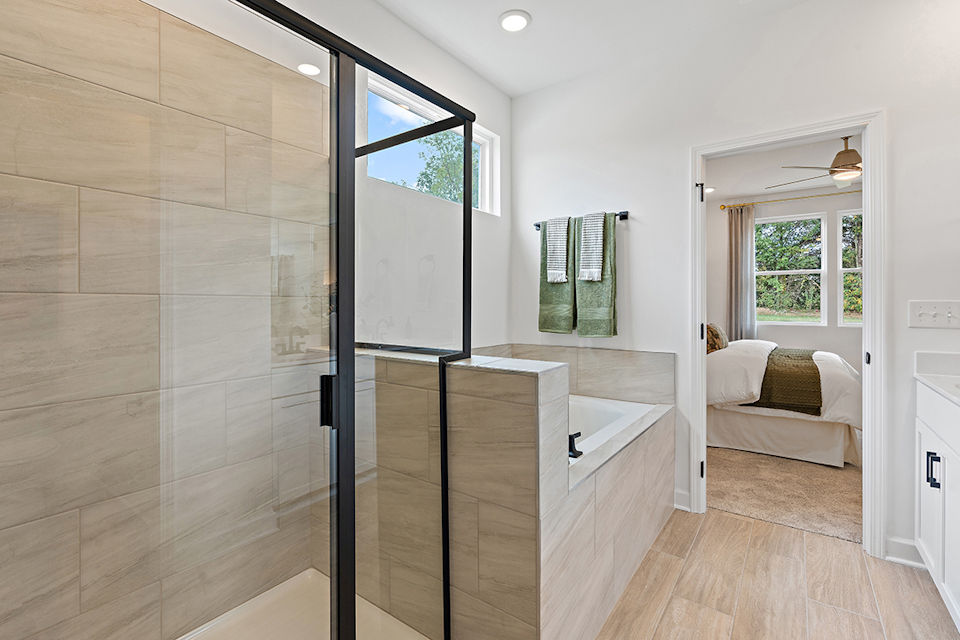 A bathroom with a glass shower.