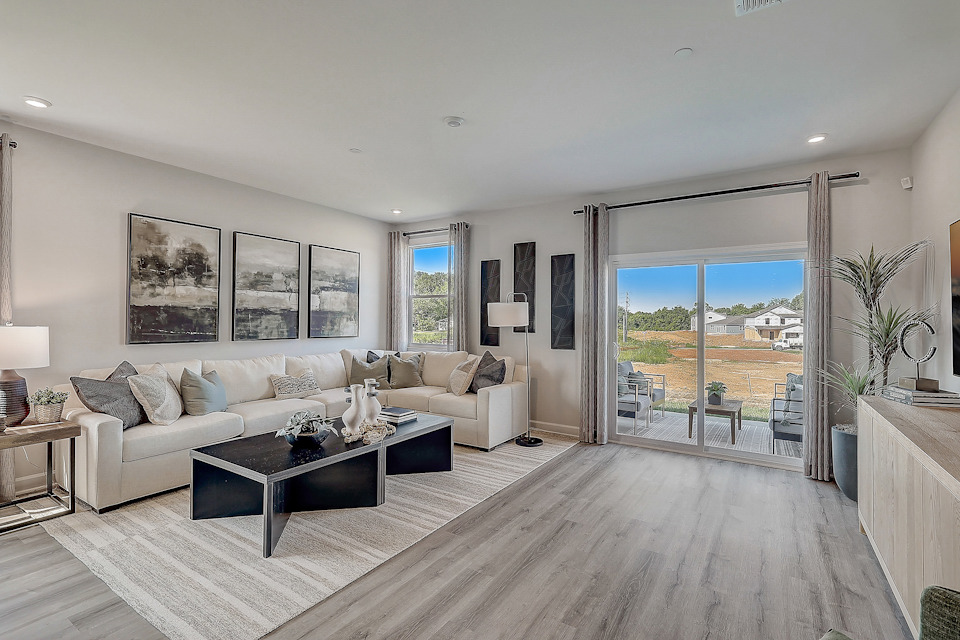 A living room with a large window.