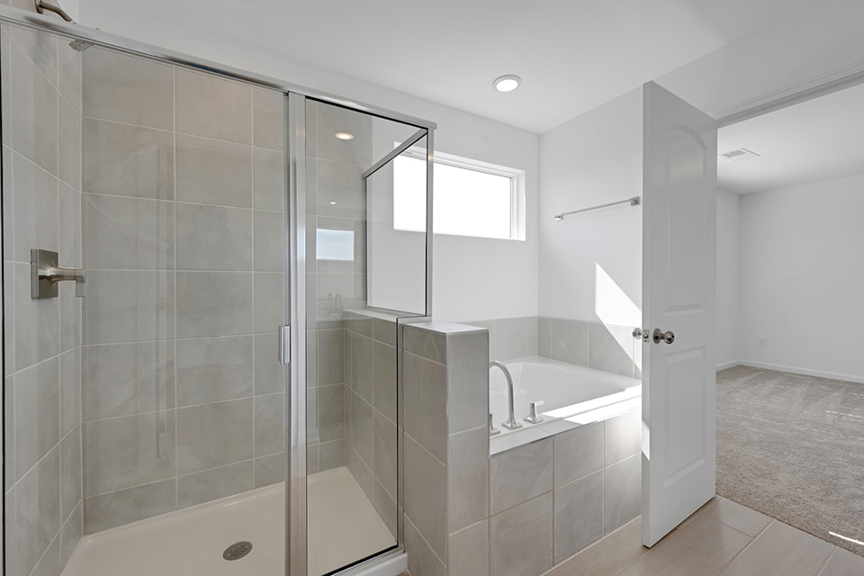 A bathroom with a glass shower.