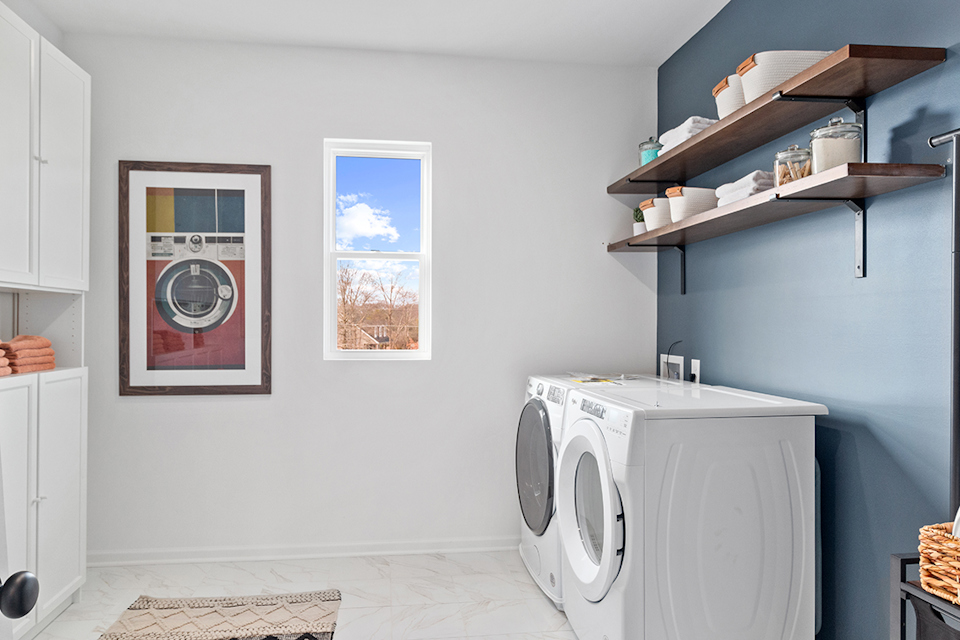 A laundry room with a washer and dryer.