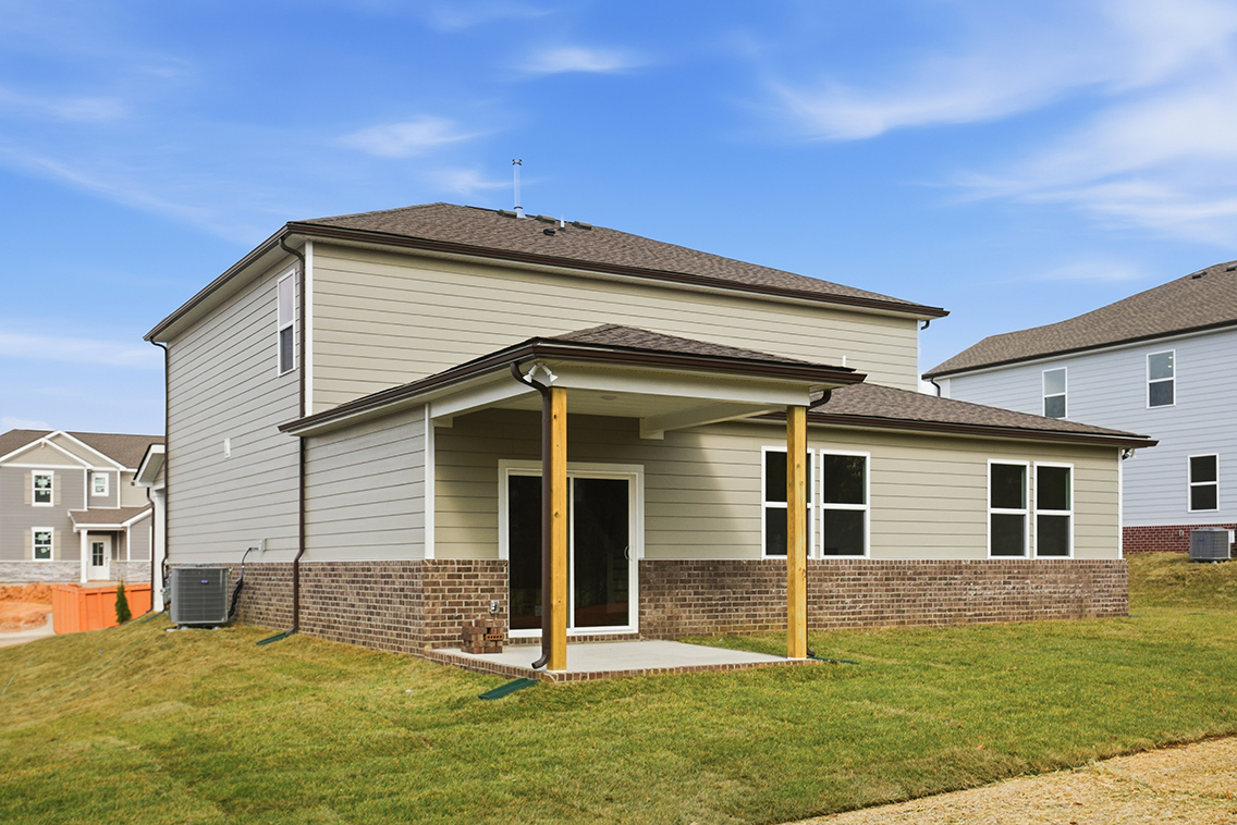 A house with a brick wall.