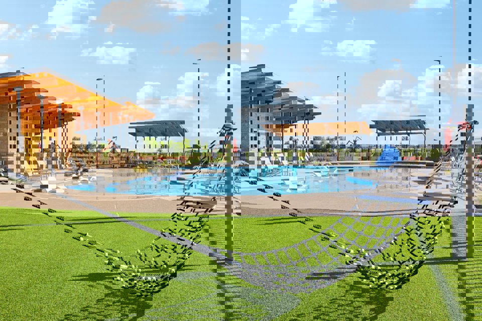 A swimming pool with a slide.