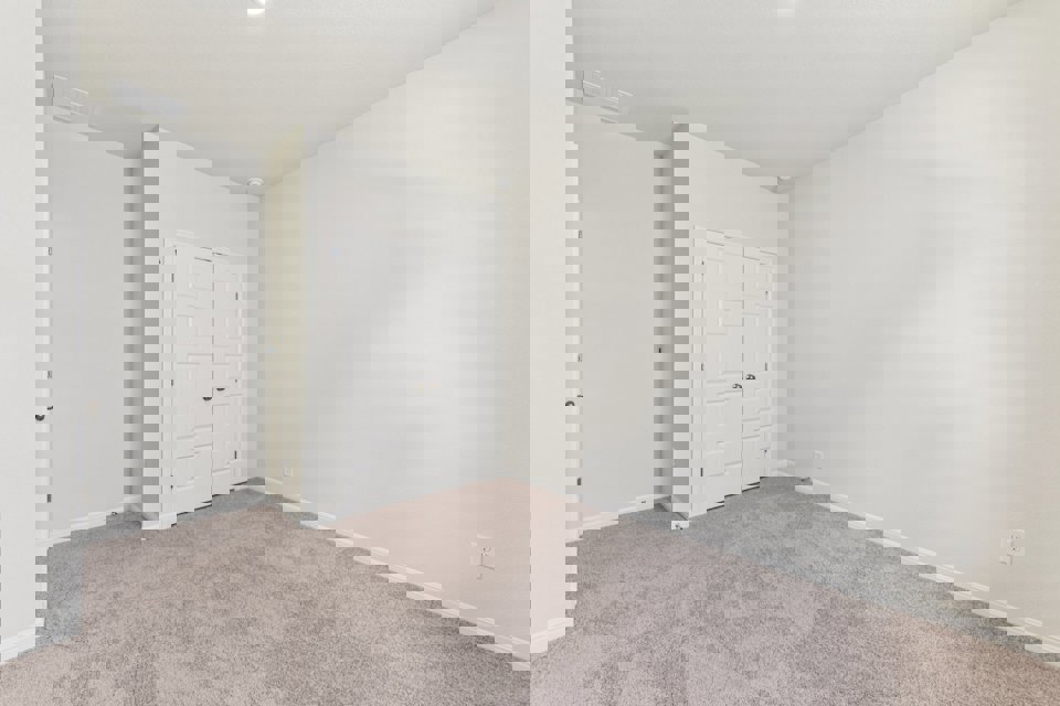 A room with white doors.